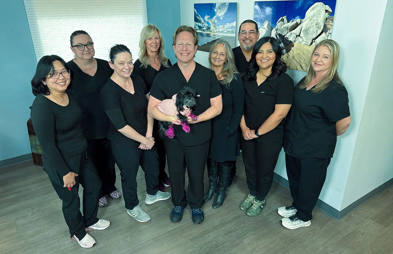 Dr. Jeffrey Monash and his professional wound care team at the front lobby of the Wound Center of Tucson. Located in Tucson, Arizona, this clinic offers advanced, compassionate treatment for chronic and complex wounds in a welcoming clinical environment.